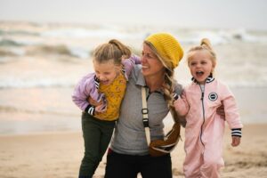 Mother and Daughters Having Fun Together